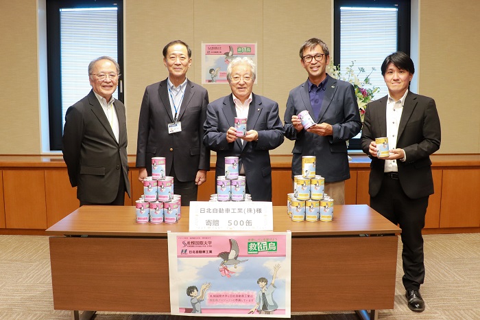 日北自動車工業㈱様より新たに500缶をご寄贈いただきました